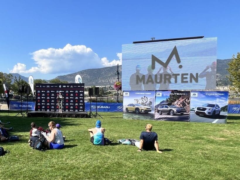 LED Screen in a grass field at an IRONMAN expo showcasing the opportunity for advertising partnerships.